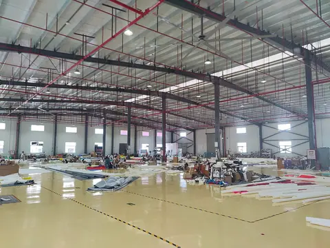 A production area with materials and workstations.
