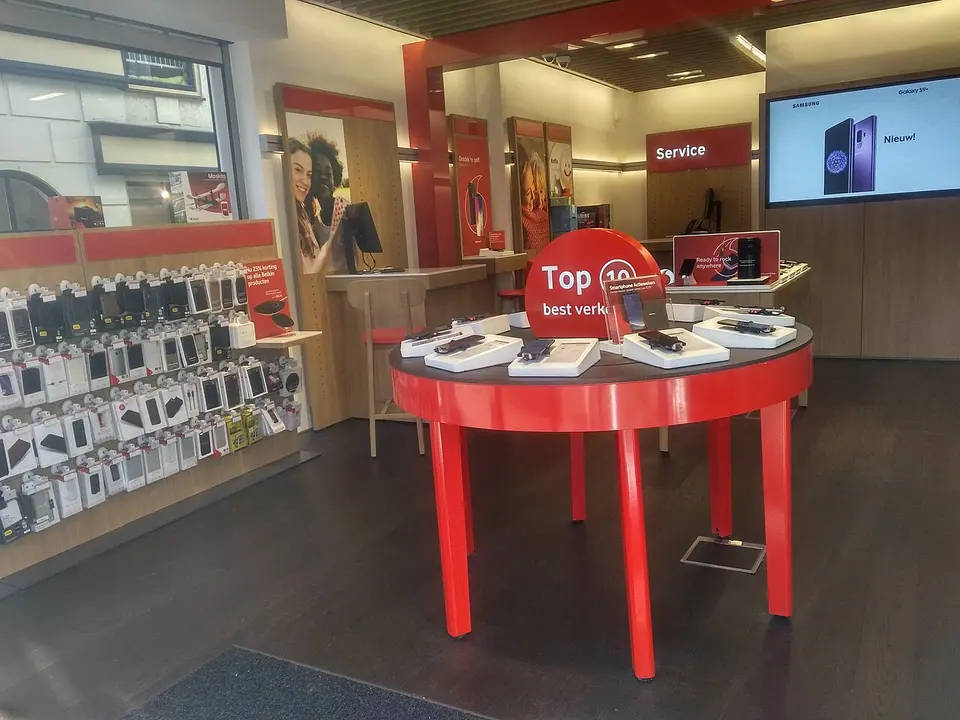 Mobile phones and accessories displayed inside a shop.